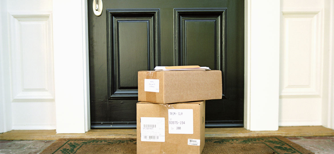 Boxes on doorstep of house